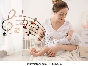 Mother with baby at home. Lullaby songs and music concept