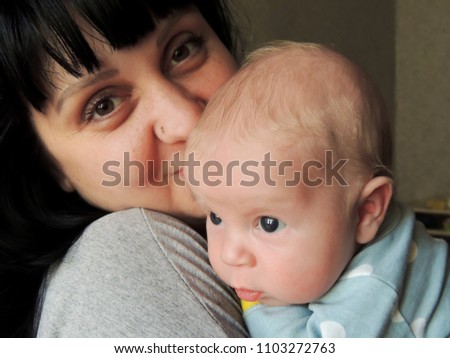 Similar – Image, Stock Photo mother with her daughter asleep in her arms