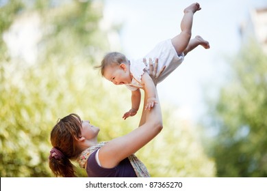 Mother With Baby At Outdoor