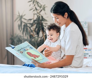 Mother, baby and reading a book on bed in nursery for child development, learning and knowledge with smile. Motherhood, kid and story in bedroom of home for bonding, infant wellness and storytelling - Powered by Shutterstock