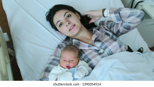 Mother and baby together after birth in first day of life - Shutterstock ID 1390354514