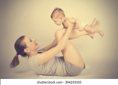 Mother with baby, vintage effect added