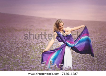 Similar – Woman posing in flower field with a handkerchief