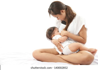 Mother is breast feeding for her baby
