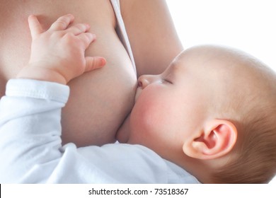 Mother is breastfeeding her baby