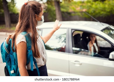 Mother In Car, Dropping Off Her Daughter To The School And Wishing Her A Good Day. Back To School, Motherhood Concept.