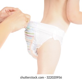 Mother Checking Pull Up Diaper Pants On Restless Toddler Isolated On White