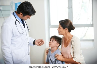 Mother, child and doctor with thermometer in hospital for consulting, check fever and monitor temperature. Family, pediatrician and patient for assessment, virus risk or diagnosis of health treatment - Powered by Shutterstock