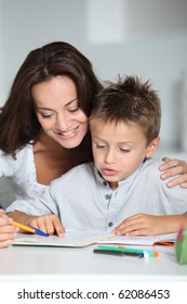 Mother And Child Doing Homework