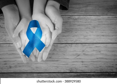 Mother And Child Hand Hold Blue Ribbon Awareness Colon Colorectal Cancer  Awareness Loop Symbolic Logo Raising Support Help People Life Living