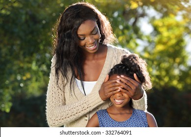 Mother And Child Heaving Fun Playing Peekaboo