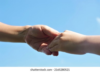 A Mother  Child Holding Hand