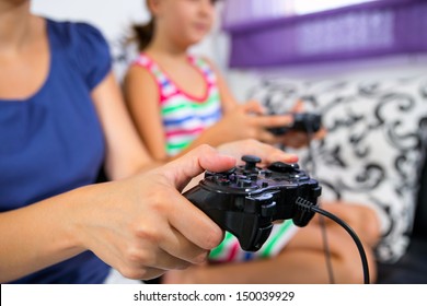 Mother And Child Playing A Video Game