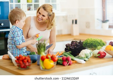 Mother and child preparing lunch