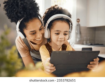 Mother, child and tablet with headphones, smile or excited for movie, music or streaming subscription. Mom, kid and digital touchscreen for education, learning or help for online class in family home - Powered by Shutterstock