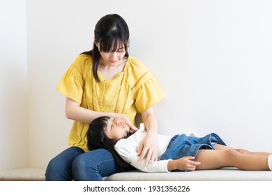 Mother And Child Waiting In The Waiting Room Of The Hospital