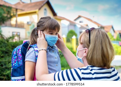 Mother And Child Wearing Face Masks