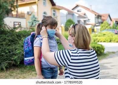 Mother And Child Wearing Face Masks