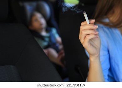 Mother With Cigarette And Child In Car, Closeup. Don't Smoke Near Kids