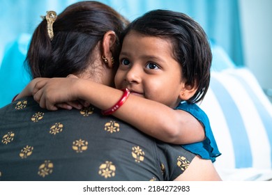 Mother comforting by embracing or hugging with recovered sick kid at hospital - concept of emotional love or caring, affectionate and medical treatment - Powered by Shutterstock