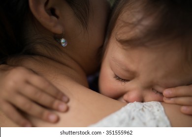 Mother Comforting A Child