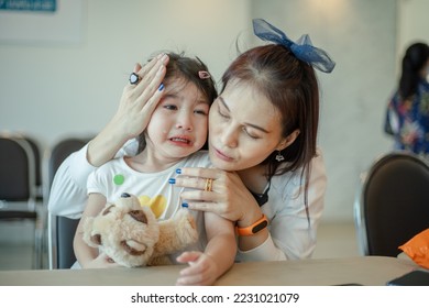 Mother comforting crying daughter with family problem concept. - Shutterstock ID 2231021079