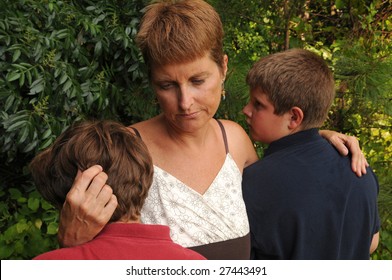 Mother Comforts Crying Children