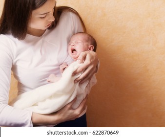 mother with crying baby