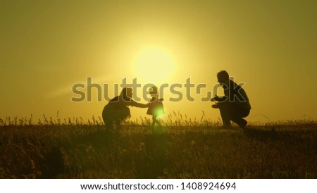 Similar – Family walking Playing