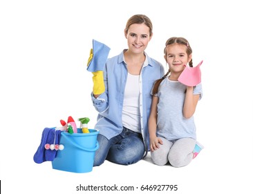 Mother And Daughter With Cleaning Supplies, Isolated On White