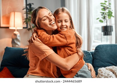 Mother and daughter connection. Emotional kid hugging tightly beautiful mommy for expressing pure feelings. Beautiful woman demonstrating unconditional love for child while spending time together. - Powered by Shutterstock