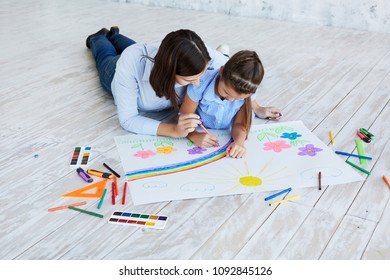 Three Children Drawing Together On Floor Stock Photo (Edit Now) 1092395486