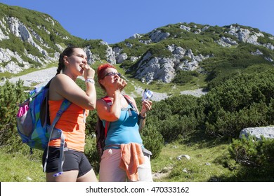 Mother And Daughter Eating Sport Power Muesli Bar, Enjoying Granola Cereal Bars, Living Healthy Active Lifestyle In Mountain Nature 