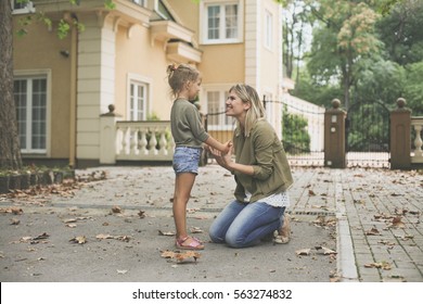 Mother and daughter having conversation.