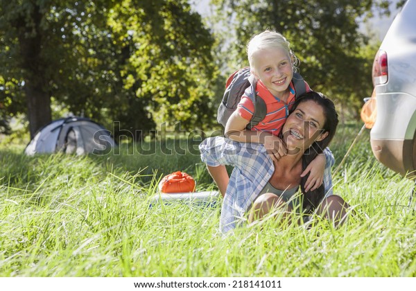 Mother And Daughter Having Fun On Countryside\
Camping Trip