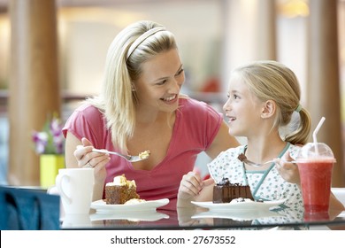 Mother And Daughter Having Lunch Together At The Mall - Powered by Shutterstock