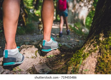 Mother and daughter hiking in forest - Powered by Shutterstock