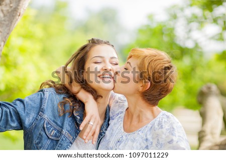 Similar – Senior woman in a wheelchair with daughter in garden