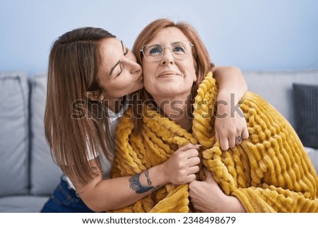 Similar – Senior woman in a wheelchair with daughter in garden