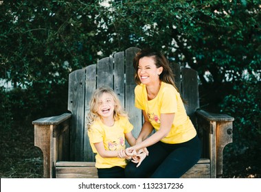 Mother And Daughter In Matching Outfits 