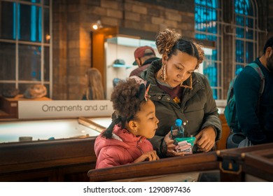 Mother And Daughter In Museum, Natural History Museum, London, 2019