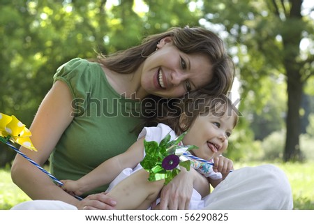 Mother and daughter in park together
