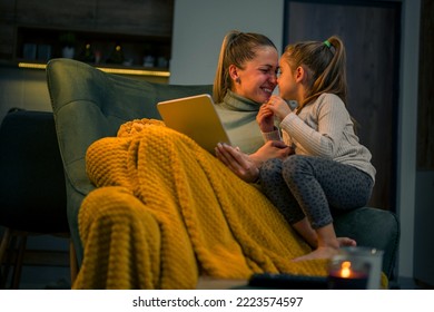 Mother and daughter sharing affection, there are spending some quality time together over the winter break - Powered by Shutterstock