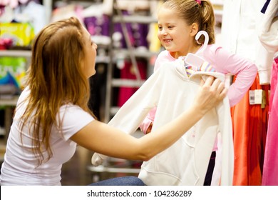 Mother And Daughter Shopping For Clothes