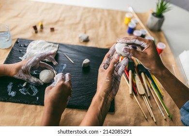 Mother And Daughter Spend Time Together And Sculpting From Clay At Home