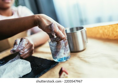 Mother And Daughter Spend Time Together And Sculpting From Clay At Home