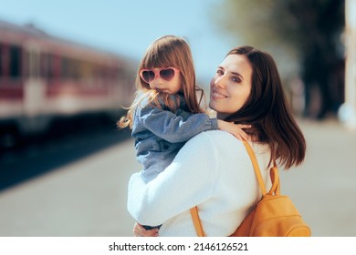 
Mother And Daughter Waiting To Get On The Train Together. Mom And Child Boarding A Train Using Public Transportation For Family Trip
