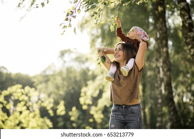 Mother And Daughter Walking