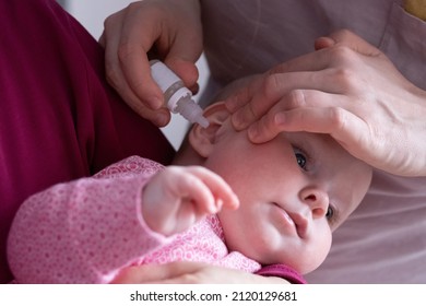 Mother Dribble Medication In Baby Ear. Ear Drops