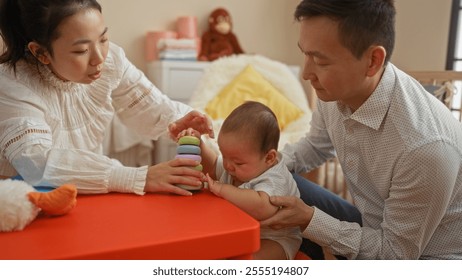 Mother and father engaging with baby boy in indoor home setting, emphasizing family bonds and playful interaction on bed. - Powered by Shutterstock